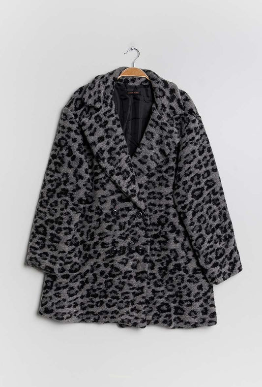 Coat in fur leopard